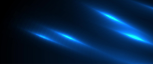 A dark background illuminated by streaks of blue light