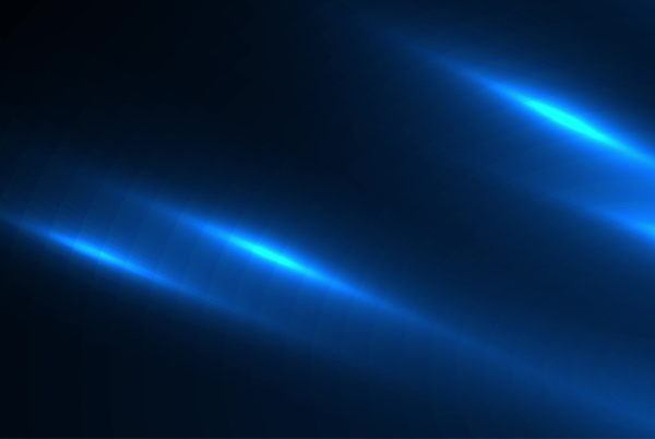 A dark background illuminated by streaks of blue light